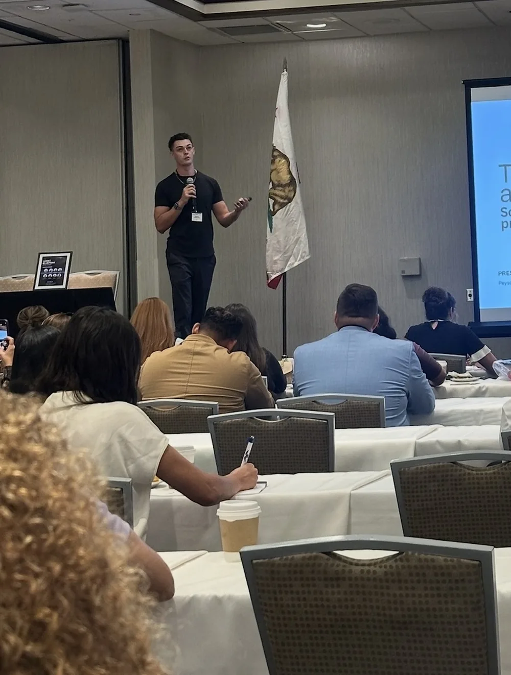 Peyson Robertson teaching a room of agents