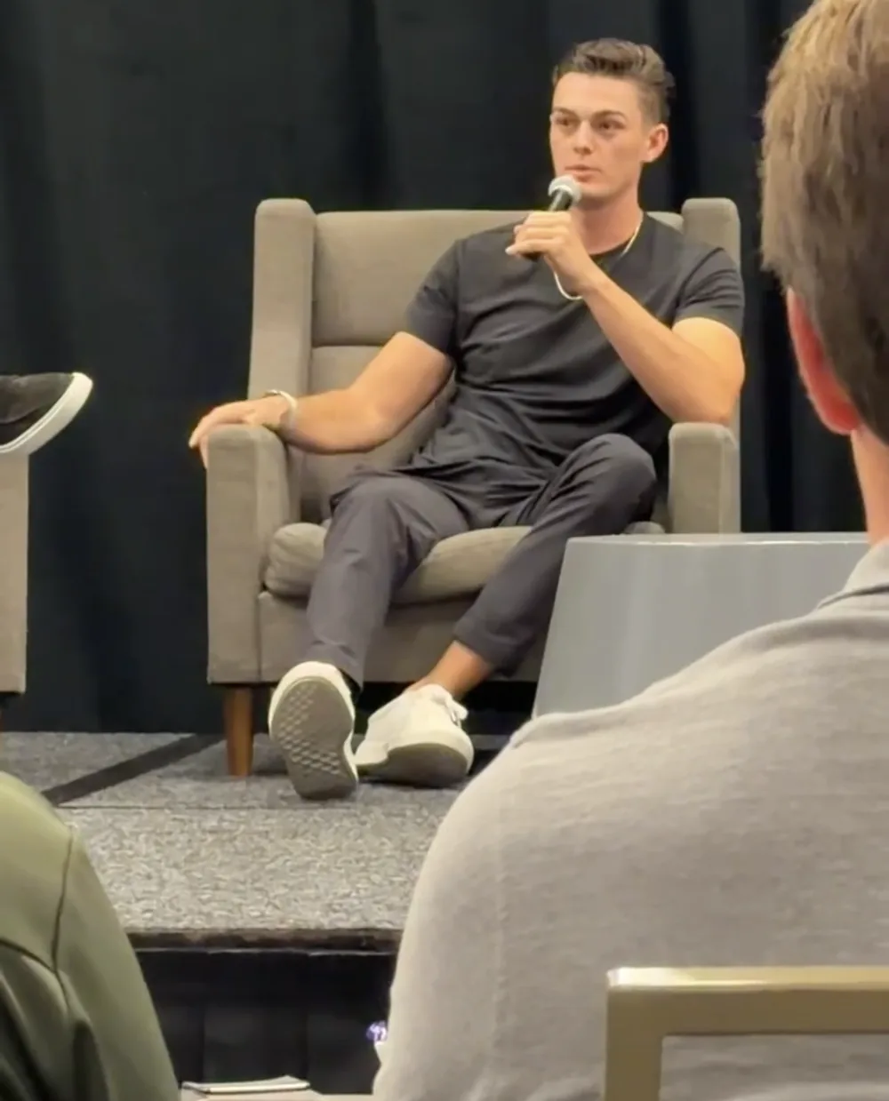 Peyson Robertson speaking on a panel