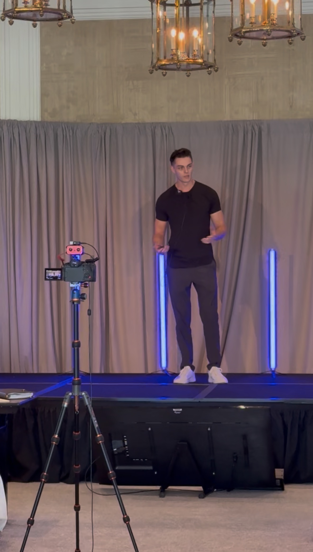 Peyson Robertson speaking on stage